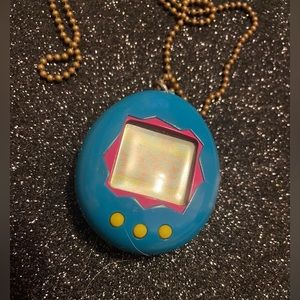 Vintage 90’s Tamagotchi Blue and Hot Pink